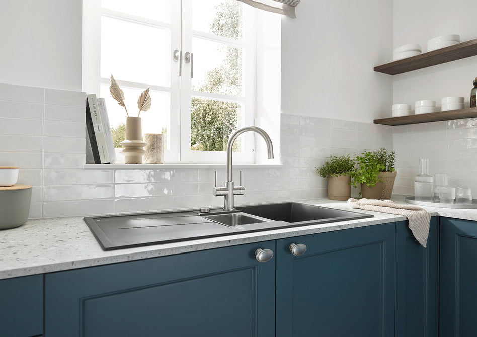 BLANCO Candor Twin Dual Lever Kitchen Mixer Tap in a Bright Kitchen with Blue Cabinets