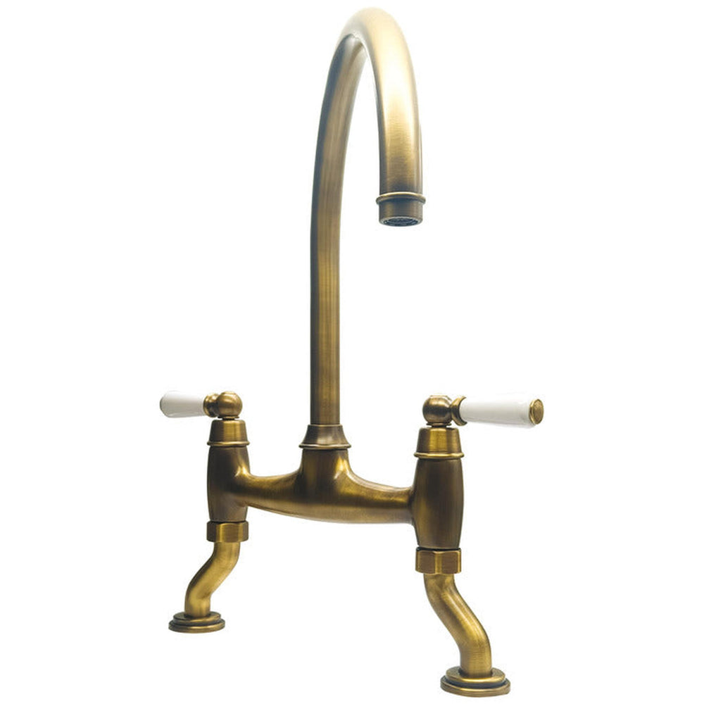 Bidbury & Co. Moreton C-spout Traditional Bridge Tap With Porcelain Handles Patinated Brass 57865610
