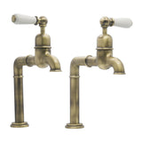 Bidbury & Co Hanford Bibcock Taps with Porcelain Handles in Patinated Brass