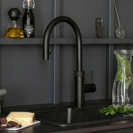 QUOOKER FLEX TAP in black in a modern kitchen setting
