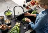 BLANCO Candor S Single Lever Kitchen Mixer Tap with Pull Out Spray Rinsing Vegetables at the Sink