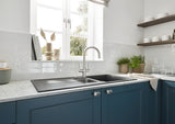 BLANCO Candor Twin Dual Lever Kitchen Mixer Tap in a Bright Kitchen with Blue Cabinets