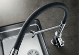 BLANCO Catris-S Flexo Single Lever Kitchen Mixer Tap with Pull Out Spray Flexible Silicone Hose over a Stainless Steel Sink
