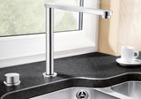 BLANCO Eloscope-F II Single Lever Kitchen Mixer Tap Extended in Front of a Window