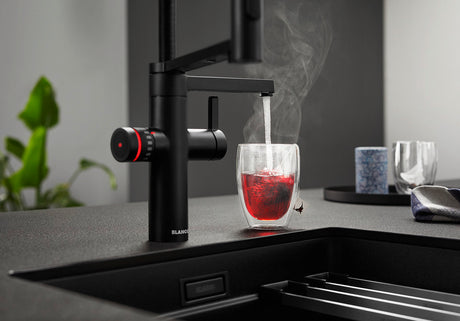 BLANCO Evol-S Pro 4-in-1 Boiling Water Kitchen Tap Dispensing Boiling Water into a Glass