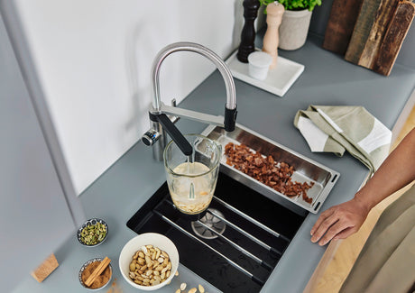 BLANCO Evol-S Pro Filter Filtered Water Kitchen Tap Filling a Glass with Filtered Water