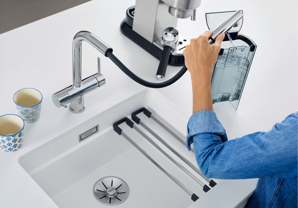 BLANCO Fontas-S II Single Lever Filter Kitchen Mixer Tap with Pull-Out Spray Filling a Coffee Machine Tank with Filtered Water