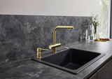 BLANCO Fontas-S II Single Lever Filter Kitchen Mixer Tap with Pull-Out Spray in Satin Gold in a Dark Kitchen