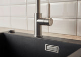BLANCO Jandora Single Lever Kitchen Mixer Tap Lever Close-Up in a White Tiled Kitchen