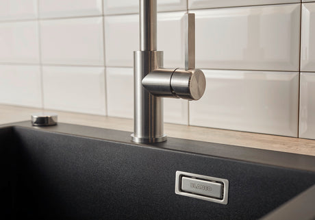 BLANCO Jandora Single Lever Kitchen Mixer Tap Lever Close-Up in a White Tiled Kitchen