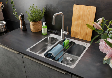 BLANCO Jandora Single Lever Kitchen Mixer Tap over a Stainless Steel Sink with Drainer Rack
