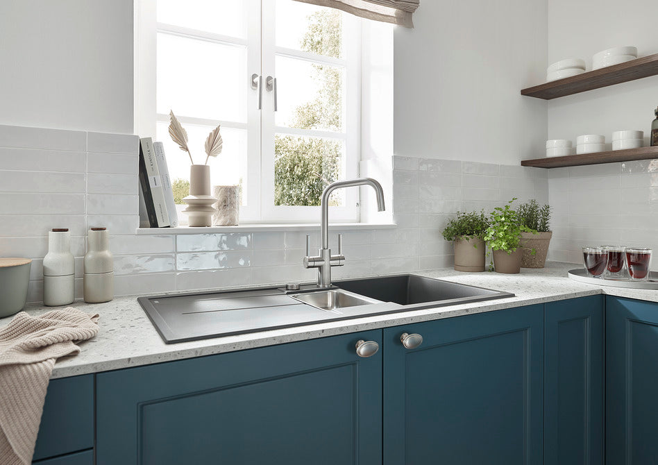 BLANCO Jandora Twin Dual Lever Kitchen Mixer Tap in a Bright Kitchen with Blue Cabinets