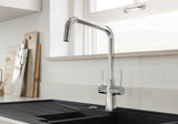 BLANCO Jax Dual Lever Kitchen Mixer Tap in Chrome in Front of a Window