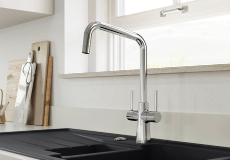 BLANCO Jax Dual Lever Kitchen Mixer Tap in Chrome in Front of a Window