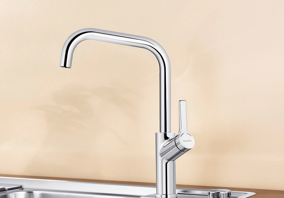 BLANCO Jurena Single Lever Kitchen Mixer Tap in Chrome over a Stainless Steel Sink