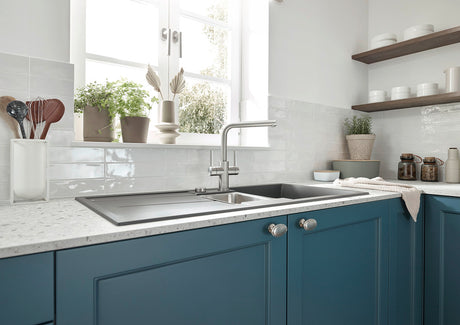 BLANCO Lanora Twin Lever Kitchen Mixer Tap in a Bright Kitchen with Blue Cabinets