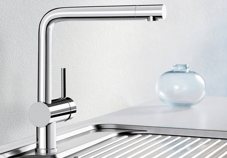 BLANCO Linus Single Lever Kitchen Mixer Tap with 360° Swivel Spout in Chrome on a Stainless Steel Sink Drainer