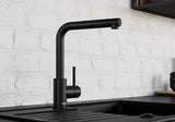 BLANCO Mila Eco-Flow Single Lever Kitchen Mixer Tap with 360° Swivel Spout in Black Matt against a White Brick Wall