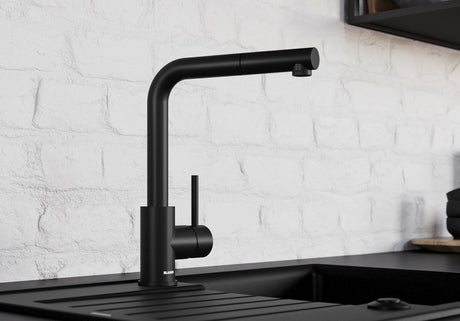BLANCO Mila Eco-Flow Single Lever Kitchen Mixer Tap with 360° Swivel Spout in Black Matt against a White Brick Wall
