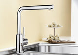 BLANCO Mila Eco-Flow Single Lever Kitchen Mixer Tap with 360° Swivel Spout in Chrome over a Stainless Steel Sink