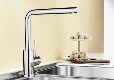 BLANCO Mila Eco-Flow Single Lever Kitchen Mixer Tap with 360° Swivel Spout in Chrome over a Stainless Steel Sink