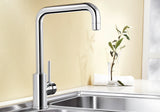 BLANCO Mili Single Lever Kitchen Mixer Tap in Chrome over a Stainless Steel Sink