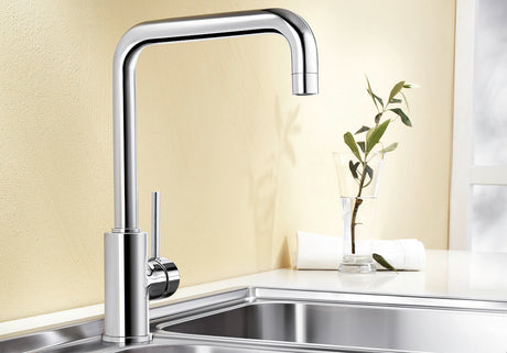 BLANCO Mili Single Lever Kitchen Mixer Tap in Chrome over a Stainless Steel Sink