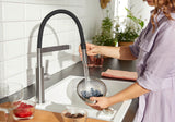 BLANCO Sonea S-Flexo Single Lever Kitchen Mixer Tap with Pull Out Spray Rinsing Blueberries with the Spray Hose