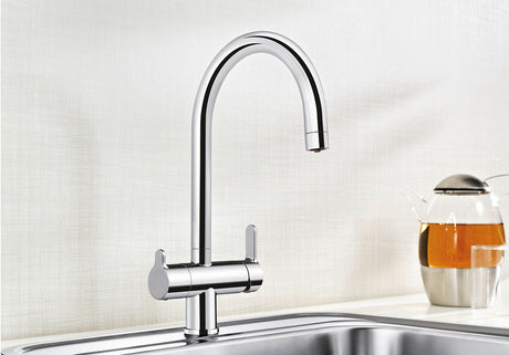 BLANCO Trima Filter Single Lever Filter Kitchen Mixer Tap in Chrome over a Stainless Steel Sink